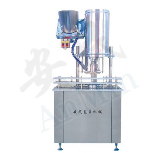 單頭全自動(dòng)旋蓋機(jī)青州安民包裝機(jī)械圖片