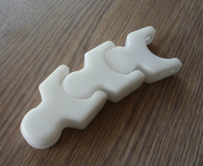 不銹鋼塑料鏈板 耐低溫塑料鏈條圖片 柔性鏈板輸送機有哪些特點